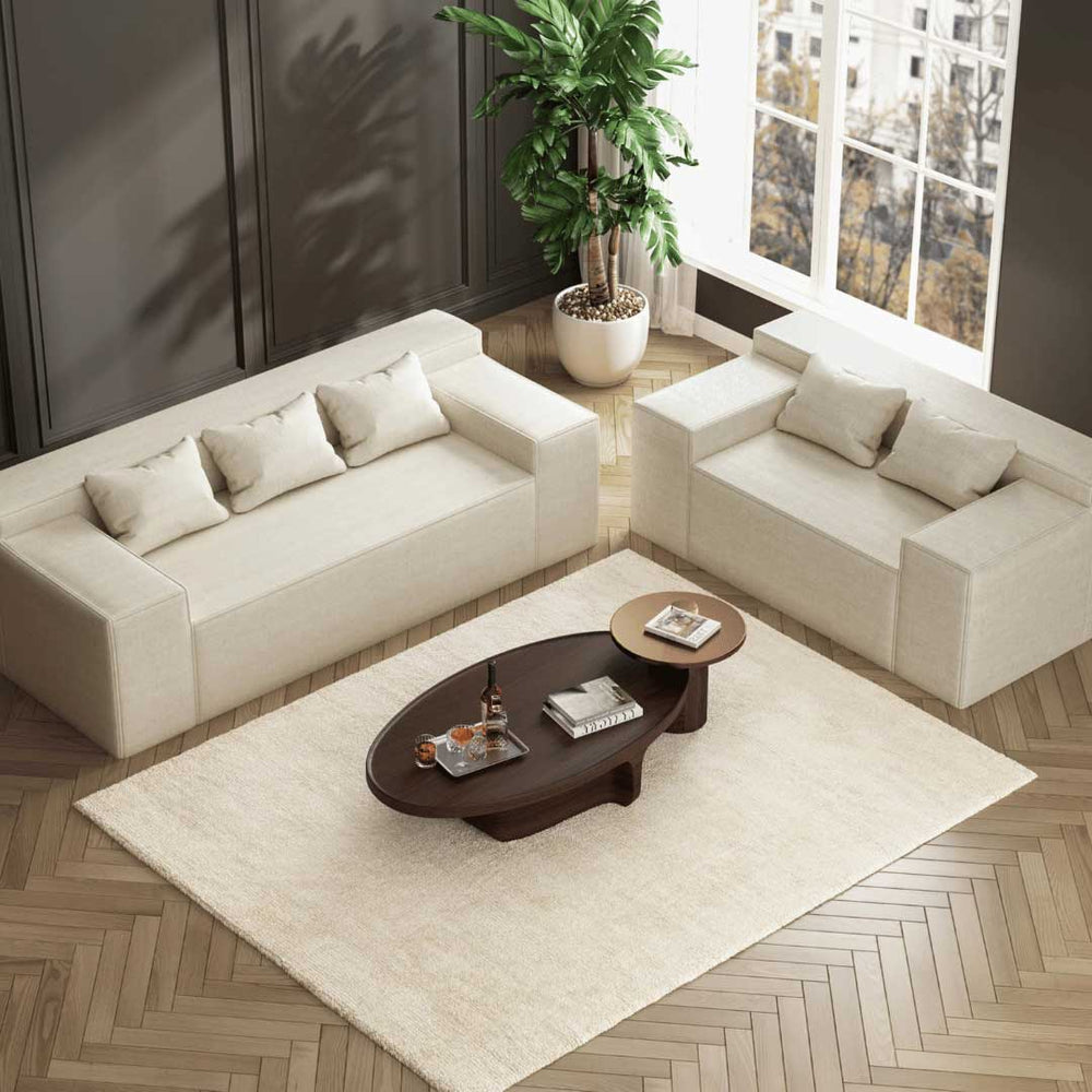 Matoresu Spring Hybrid Couch Linen Sofa with woman relaxing on 3-seater version in bright space